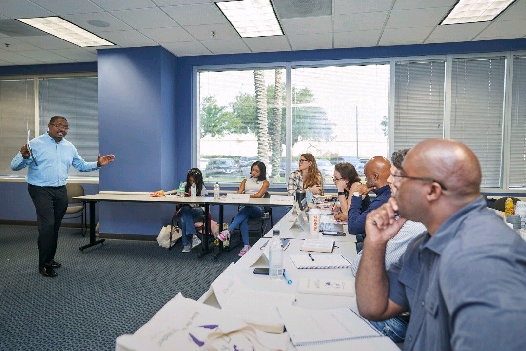 Bristan Heaven teaching a room of business leaders