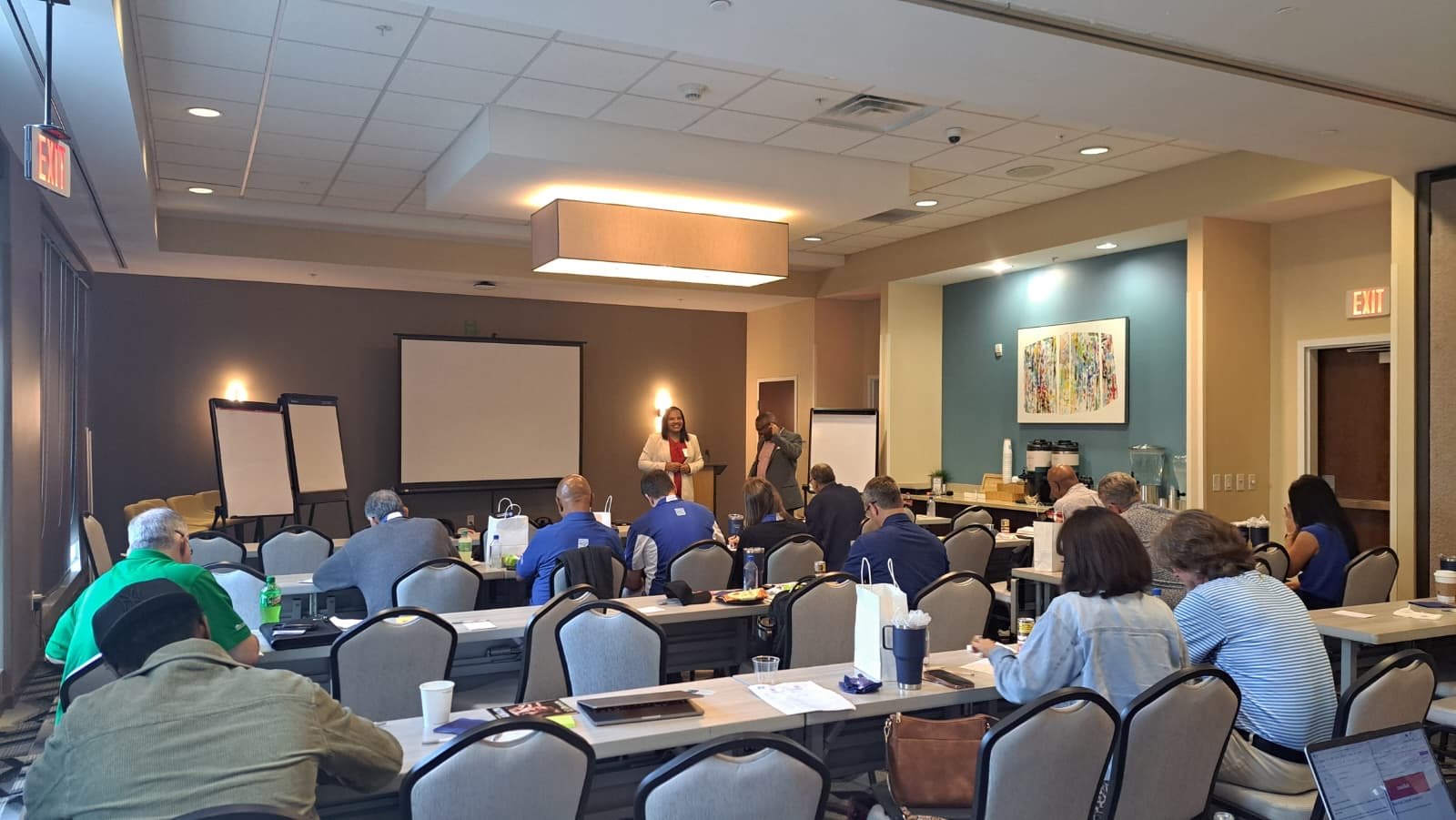 Latondra and Bristan Heaven leading a workshop for a room of business leaders